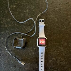 Fitbit Smartwatch VERSA LITE with Light Purple Band